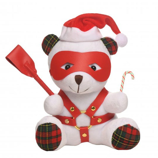 Soft Plush Dom Bear wearing a red Santa cap with green and red flannel ears and feet, holding a candy cane and a riding crop, showcasing its playful kink accessories on a festive background.