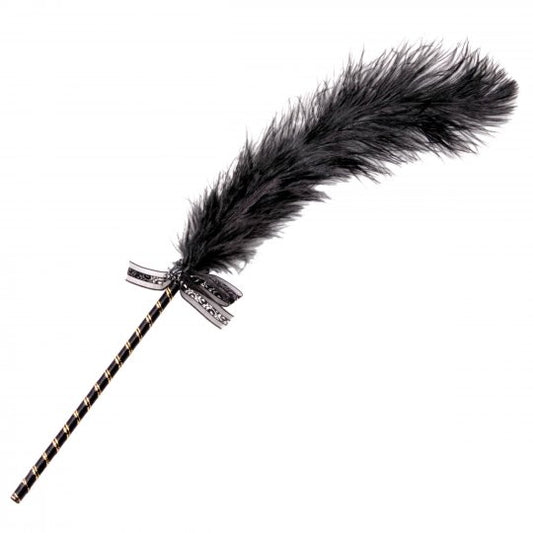 Elegant black ostrich feather tickler with a fabric wrapped handle and a crystal-embellished bow, measuring approximately 17 inches in length, designed for sensual teasing and intimate play.