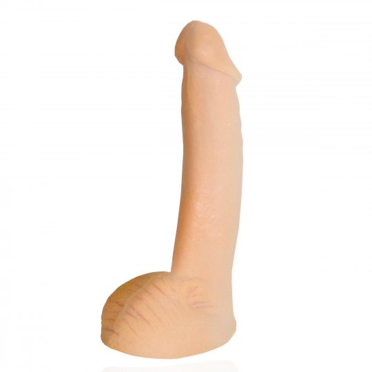 A kit for creating a personalized, vibrating silicone replica of a penis and scrotum, including molding gel, a special tube, and a vibrating unit, with measurements and product details displayed.