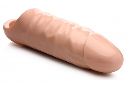 A realistic flesh-colored dildo extender with a bumpy internal tunnel and secure ball strap, measuring 9.5 inches in total length and 2.75 inches in diameter, displayed against a neutral background.