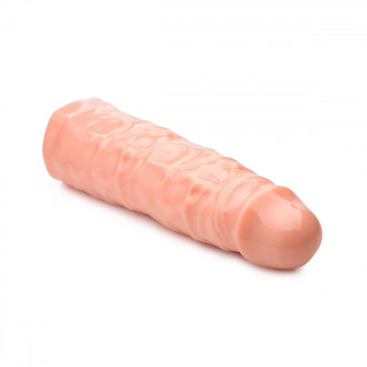 Image of a penis enhancing sleeve designed to add three inches in length and one inch in girth, featuring a realistic appearance with a bold head and bulging veins, made of flexible TPR material, showcasing its total length of 8.5 inches and insertable length of 5.5 inches, with an interior diameter of 1.5 inches and exterior diameter of 2 inches, displayed in flesh color.