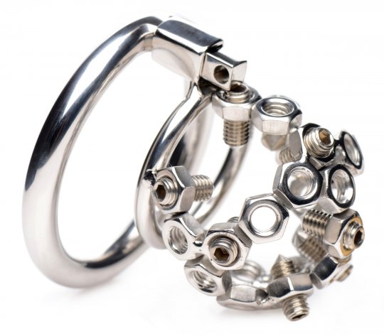 Stainless steel chastity device with cage and two size rings, featuring 10 adjustable screw spikes for added discomfort, complete with a lock and allen wrench, displayed on a neutral background.