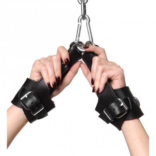 Leather suspension cuffs with padded fleece interior, designed for comfort and durability in suspension play.