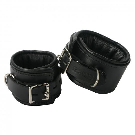 Comfortable leather restraints with padding, adjustable from 6 to 13 inches, 2.5 inches wide, in black with metal accents